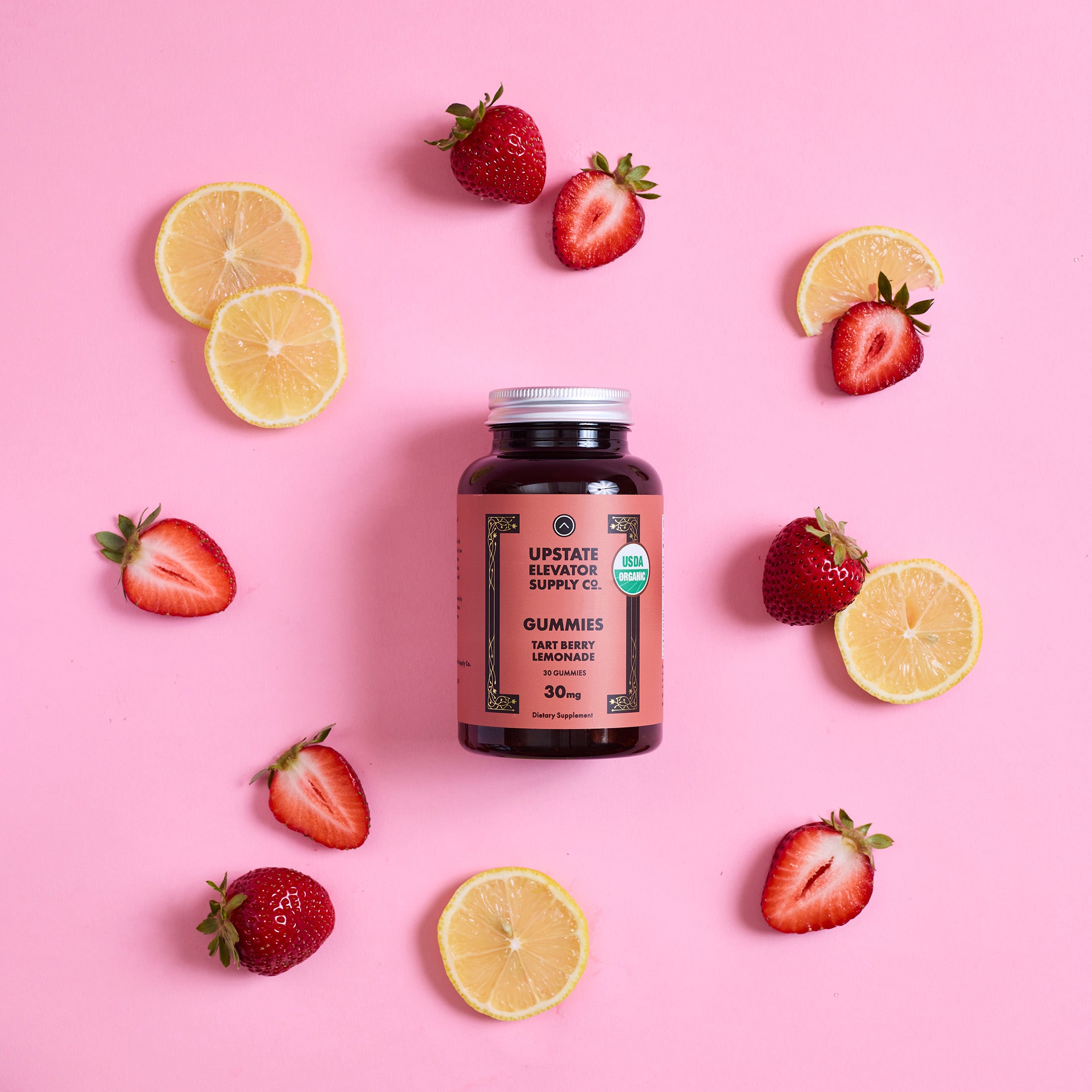 Tart_Berry_Gummy_bottle_with_fruit.jpg